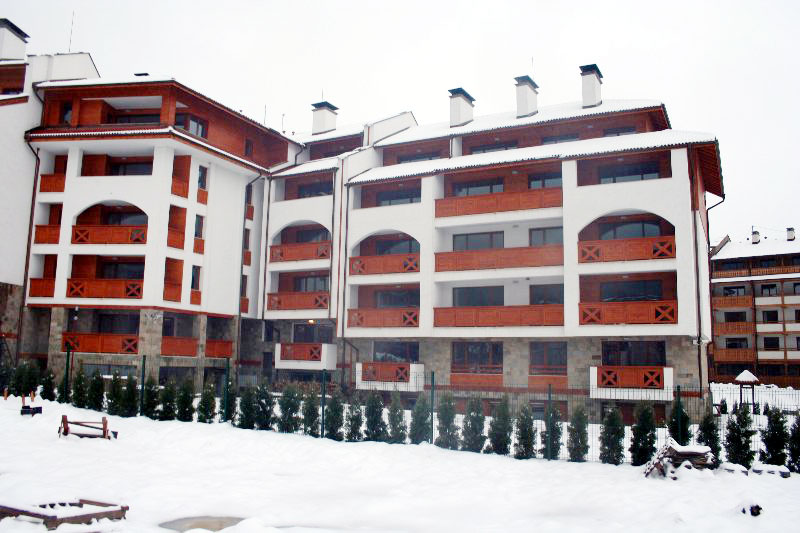 The facade of Pirin Lodge in winter